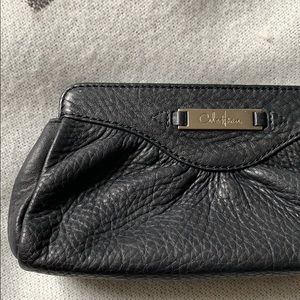 Cole Haan magnetic close mini clutch.  NEVER used!